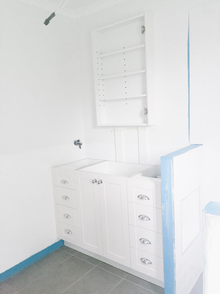 Small bathroom with custom cabinetry
